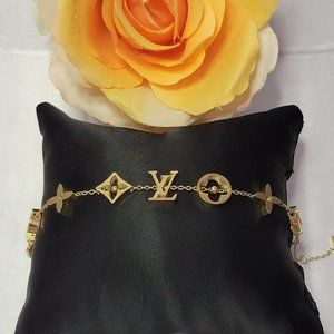 Gold Charm Louis Vuitton Bracelet